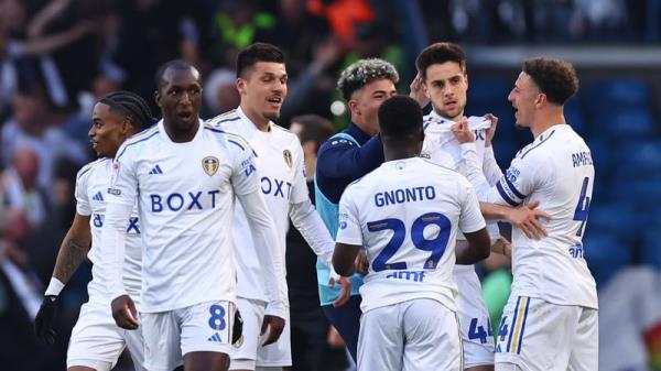 The Leeds players celebrate the first of their four goals at Elland Road