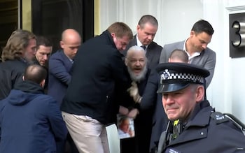 Julian Assange is dragged from the Ecuadorian Embassy in Lo<em></em>ndon in 2019