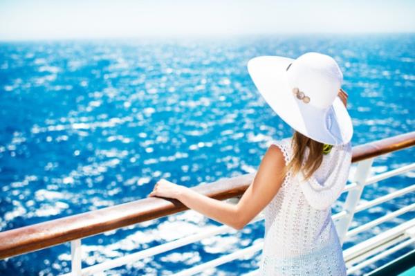 Woman enjoying on a cruise.