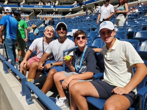 Cousins David Hedaya and Sam Homway were using hats and beverages to stay cool.