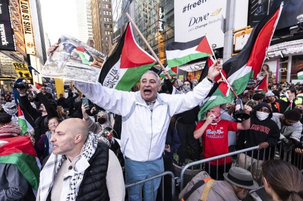 People gather for a rally in support of Palestine near Times Square