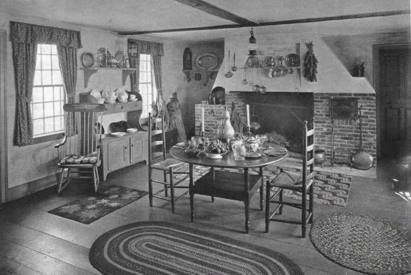 Ernesta and William Bullitt’s dining room, with wide-plank wood floors and a large fireplace.