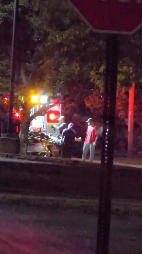 Rescuers load a person into an ambulance at the scene of a mass shooting in Lewiston, Maine, U.S., October 25, 2023.