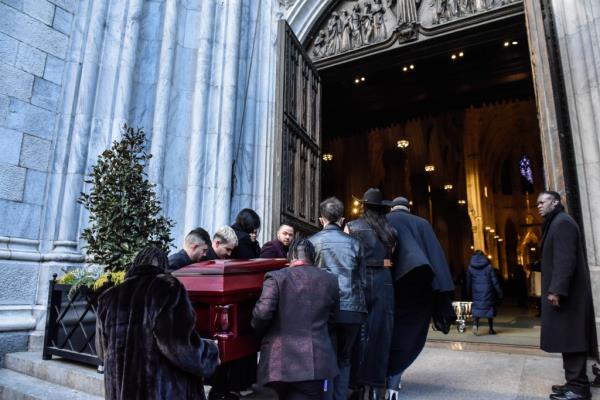 People carrying coffin into St. Patrick's Cathedral during the funeral of transgender community activist Cecilia Gentili. 