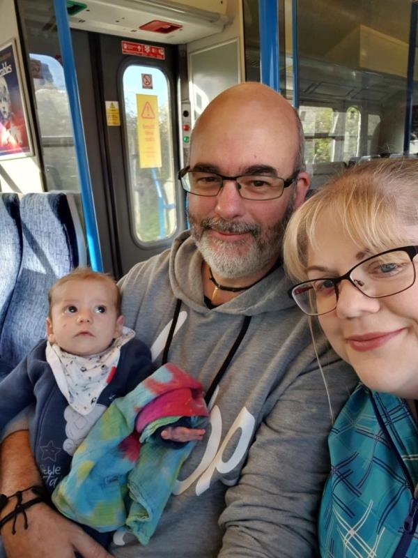 Thomas is photographed with his parents just as his chemotherapy journey began.