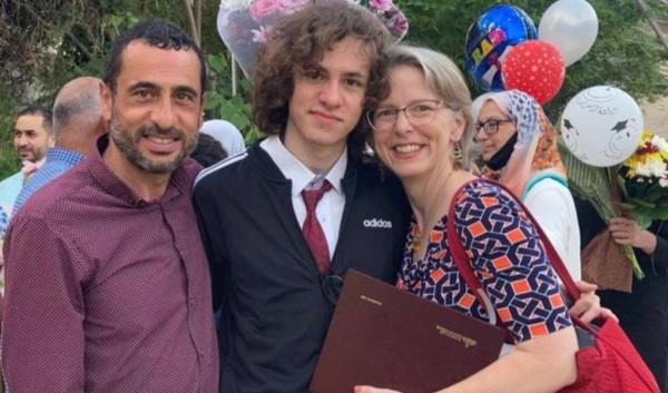 Hisham Awartani with his parents.