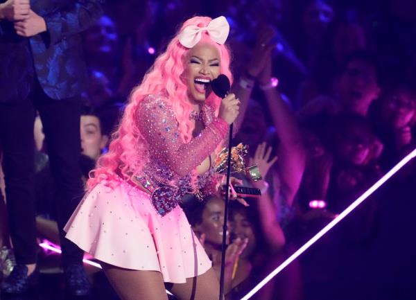 Authorities at the Amsterdam airport attempted to arrest rapper Nicki Minaj for alleged drug possession.