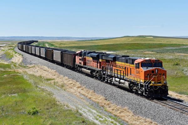 BNSF railroad train hauling carloads of coal from the Powder River Basin, Montana, amid safety and service co<em></em>ncerns due to layoffs and funding campaigns