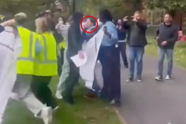 The pro-Palestine supporters are holding traditio<em></em>nal Arab headscarves while surrounding someone believed to be a Jewish student.