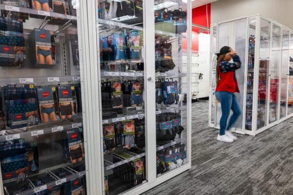 Merchandise behind plexiglass and locked up.