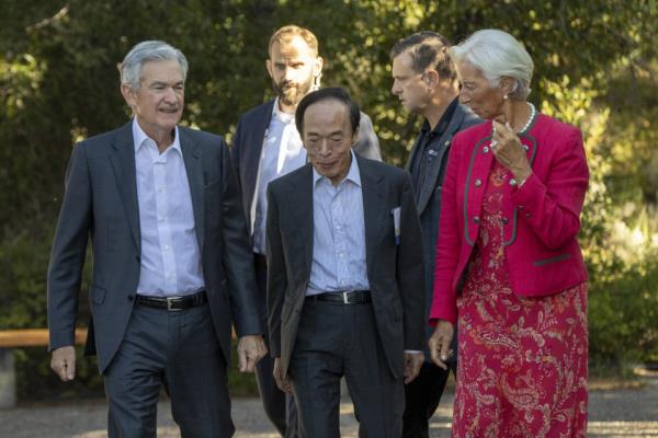 JACKSON HOLE, WYOMING - AUGUST 25: President of the European Central Bank Christine Lagarde, Bank of Japan Gov. Kazuo Ueda (C), and chair of the Federal Reserve Jerome Powell (L) speak during the Jackson Hole Eco<em></em>nomic Symposium at Jackson Lake Lodge on August 25, 2023 near Jackson Hole, Wyoming. Powell signaled in a speech Friday morning that if necessary, interest rates could be raised again. (Photo by Natalie Behring/Getty Images)