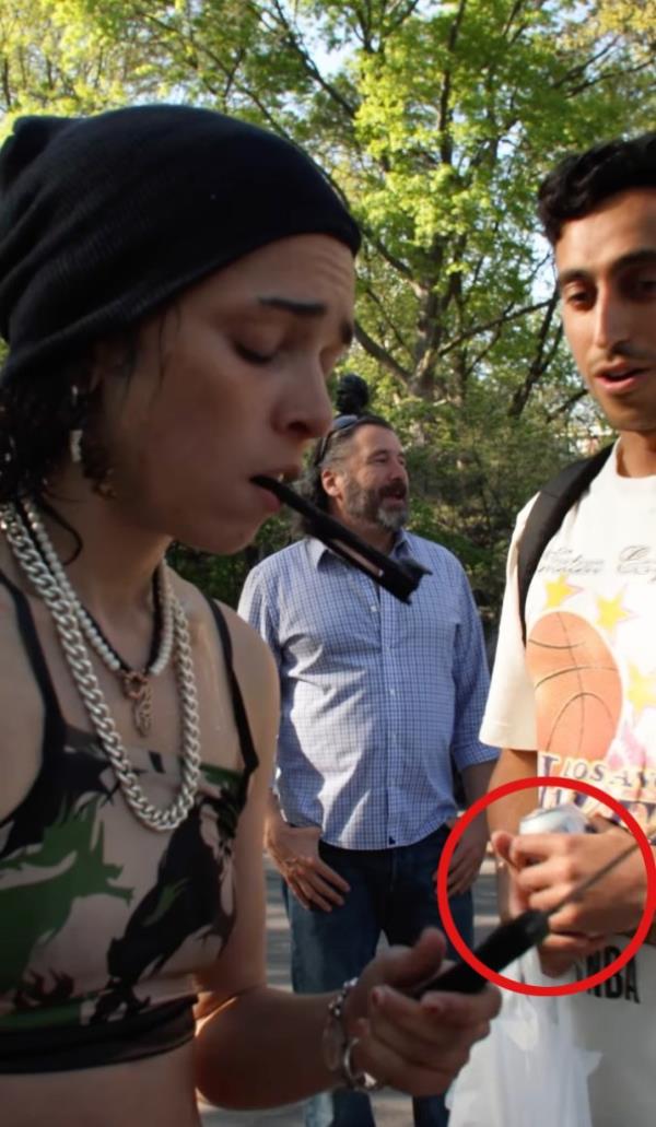 Woman holding what appears to be a knife