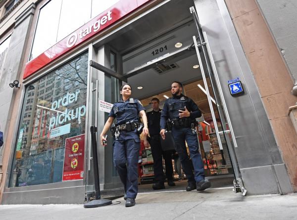 Cops walk out of a Target.