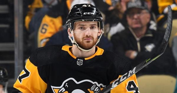 PITTSBURGH, PA - MARCH 31: Adam Johnson #47 of the Pittsburgh Penguins skates against the Carolina Hurricanes at PPG Paints Arena on March 31, 2019 in Pittsburgh, Pennsylvania. (Photo by Joe Sargent/NHLI via Getty Images)