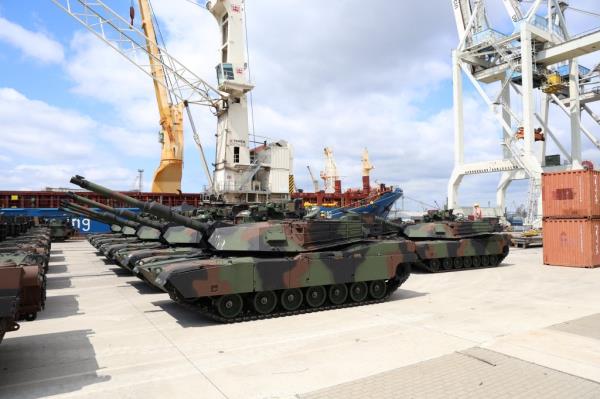 General view of the delivery of the first company of U.S.-made Abrams M1A1 tanks to arrive in the country under a deal finalised in 2022, at the port in Szczecin, Poland, June 28, 2023. 