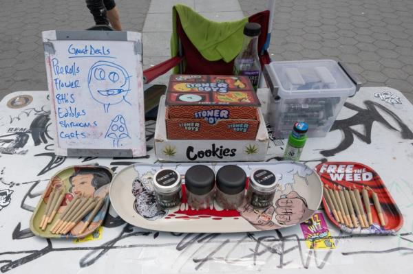 Drugs and paraphernalia on table in Washington Square Park