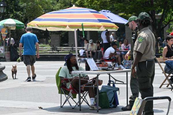 Park Enforcement Patrol talking to a drug dealer