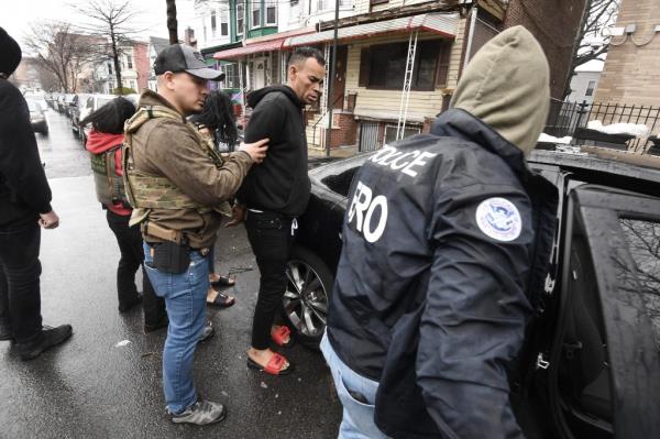 Federal agents raid a home in the Bronx allegedly taken over by squatters.