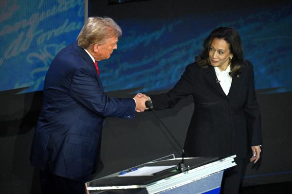 Kamala Harris, US Vice President and Democratic presidential candidate, shaking hands with former US President Do<em></em>nald Trump at a presidential debate in Philadelphia.