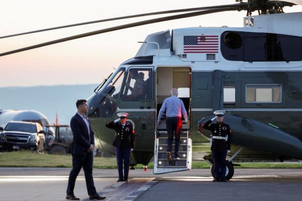 President Joe Biden boards Marine One en route to Camp David at Hagerstown Regio<em></em>nal Airport in Hagerstown, Maryland, U.S. June 20, 2024.