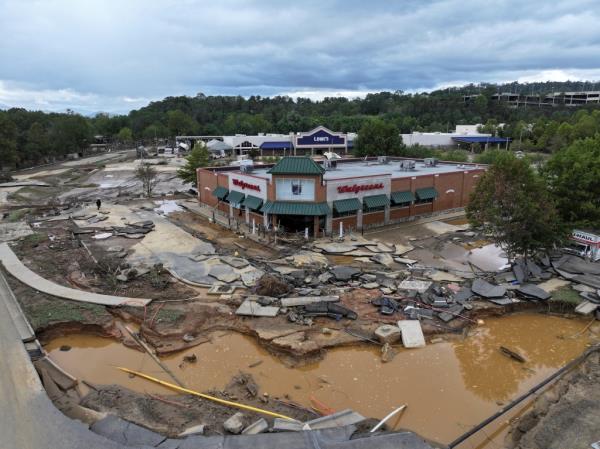 An elevated shot of hurricane devastation surrounding a Walgreens store.