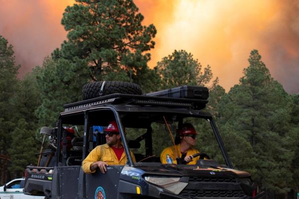 USDA Forest Service firefighters return from fighting the South Fork Fire in Ruidoso, New Mexico on June 17, 2024.