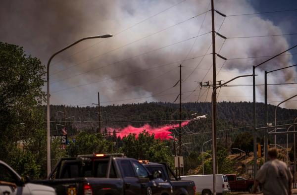 An air tanker dropping fire retardent in Ruidoso on June 18, 2024.