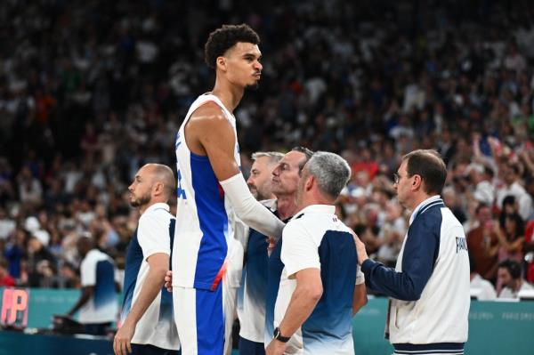 Victor Wembanyama reacts after the USA won the men's Gold Medal basketball match 