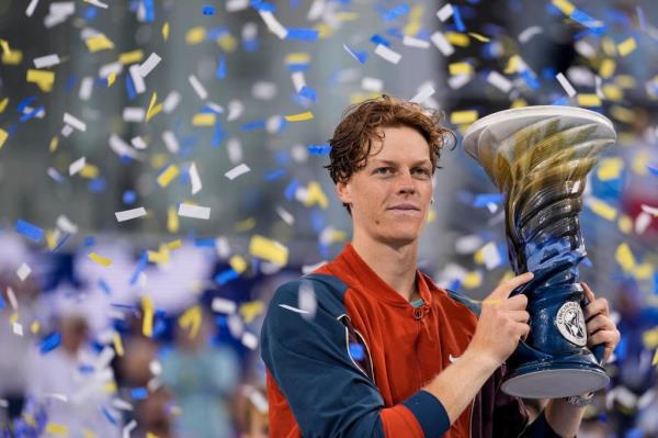 Jannik Sinner of Italy accepts the Rookwood Cup champio<em></em>nship trophy after defeating Frances Tiafoe of the United States in the men's singles final on day seven of the Cincinnati Open on Aug. 19, 2024.