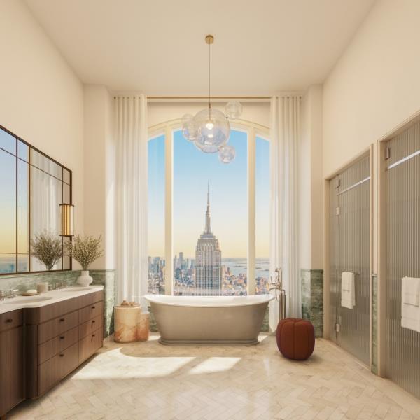 A spa-like bath retreat in the unit looks out to the Empire State Building.