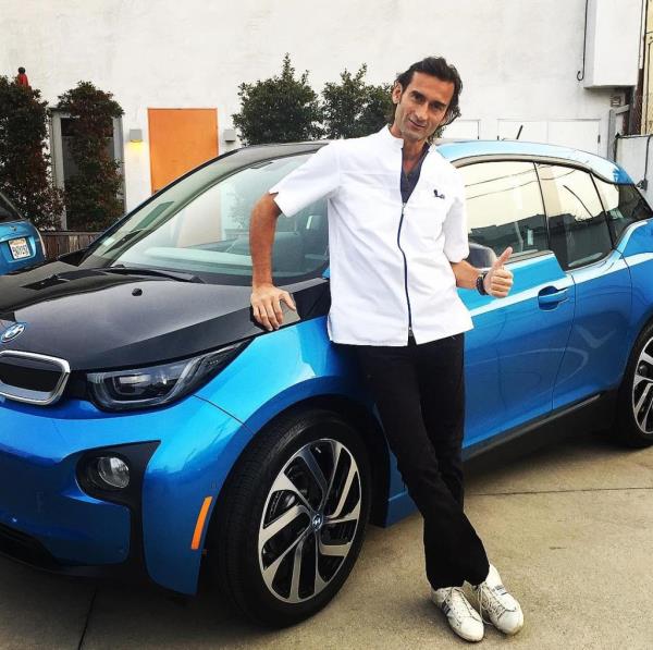 Jovanovic is pictured with his BMW.