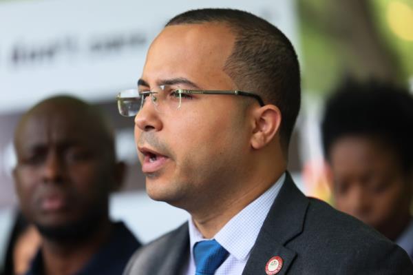 Councilmember Oswald Feliz speaking at a press conference, calling for charges against the man involved in Jordan Neely's choking incident