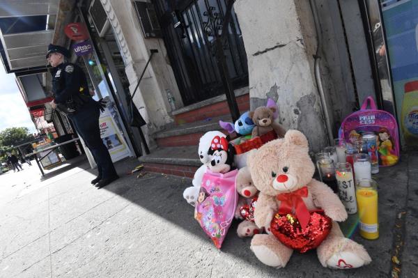 An improm<em></em>ptu memorial set up for the little boy, who was starved to death over many months, prosecutors say. 