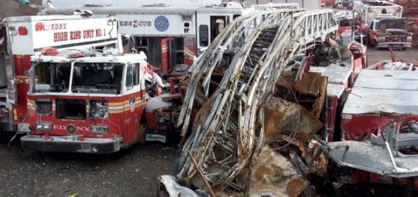 A twisted rescue ladder on top of a New York City Fire Truck sits among World Trade Center debris at the Fresh Kills Landfill in New York 14 January, 2002. Crews at ground zero have removed 951,272 tons of debris and steel as of 03 January, according to city officials. That is roughly three fourths of the 1.2 million tons that covered the area at the outset, according to estimates by the Federal Emergency Management Agency. AFP PHOTO Don EMMERT (Photo by Don EMMERT / AFP) (Photo by DON EMMERT/AFP via Getty Images)