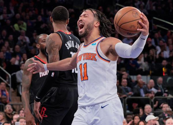 Jalen Brunson, who scored 30 points in his return, celebrates after scoring and drawing a foul during the fourth quarter of the Knicks' 109-94 win over the Rockets.