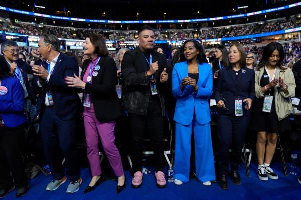 Delegates dances during the Democratic Natio<em></em>nal Co<em></em>nvention Wednesday, Aug. 21, 2024, in Chicago.