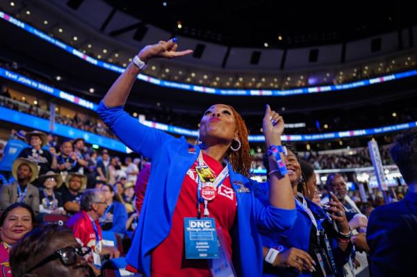 People dancing in the stands at the 2024 Democratic Natio<em></em>nal Co<em></em>nvention at the United Center in Chicago, Illinois, USA, on Wednesday, August 21, 2024.