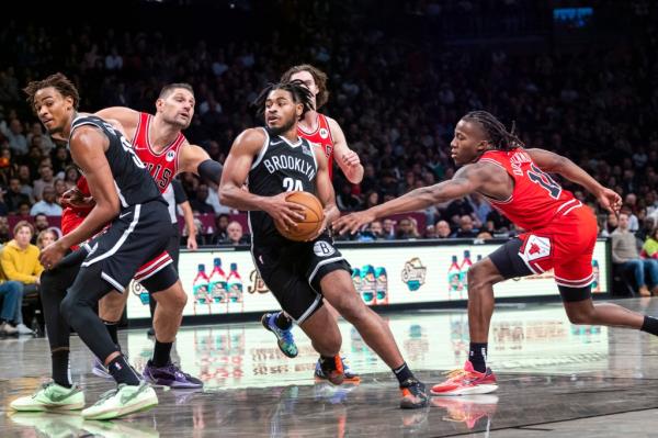 Brooklyn Nets guard Cam Thomas (24) drives to the net in the second half 