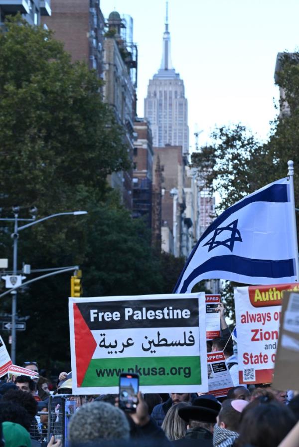 Tension remain high as hundreds of Pro-Israel and Pro-Palestine supporters gather at Washington Square Park in Manhattan for the dual rallies today.