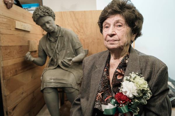 Maria Pulsone, a 95-year-old retired master seamstress, recently reunited with a her sculpture, which will be on display at the museum.