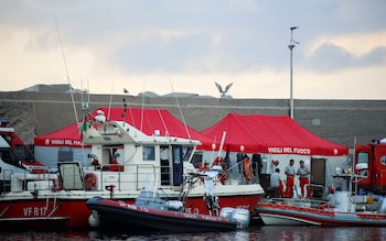 Rescue perso<em></em>nnel work at the scene wher<em></em>e a luxury yacht sank