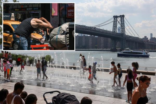 People cool off in a fountain in Domino Park