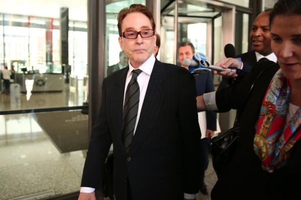 Ty Warner, founder of Beanie Babies, leaving the Dirksen U.S. Courthouse in Chicago after entering a guilty plea for tax evasion.