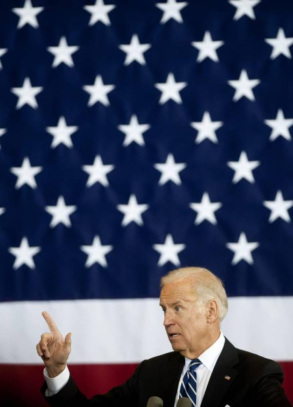 BIden pointing while talking at an event