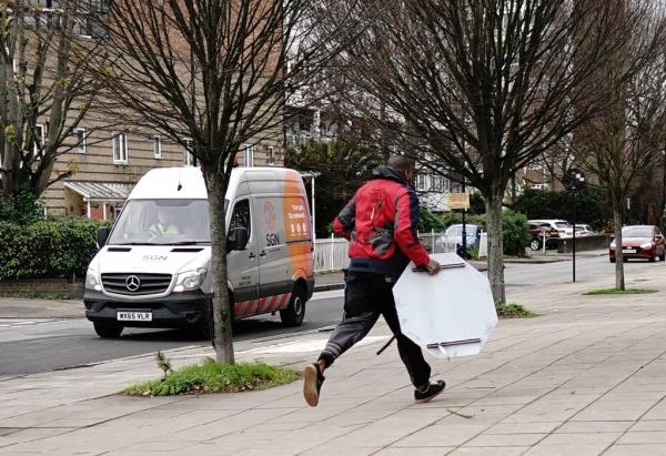 The man running off with the artwork