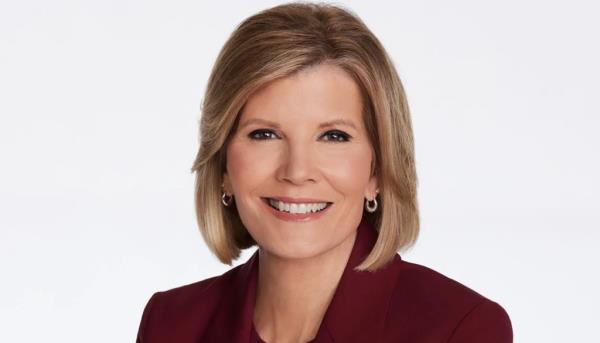 Kate Snow smiles in headshot