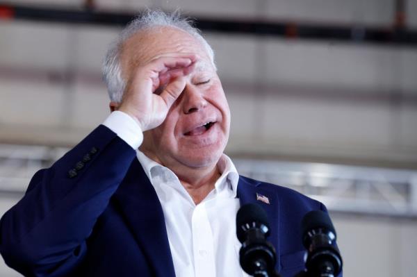 Democratic vice presidential candidate, Governor Tim Walz, getting emotio<em></em>nal during a campaign rally in Romulus, Michigan, August 7, 2024