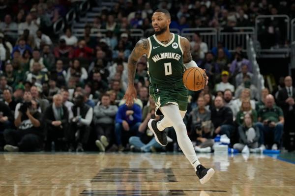 Damian Lillard dribbles during the Bucks' win over the 76ers on Oct. 28 -- in a different jersey than the one in the digitally altered video. 