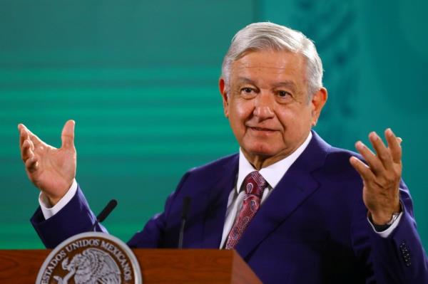 Mexico's President Andres Manuel Lopez Obrador gestures during a news co<em></em>nference at the Natio<em></em>nal Palace in Mexico City.