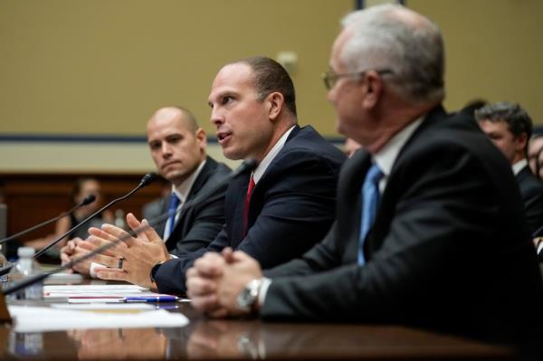 (L-R) Ryan Graves, executive director of Americans for Safe Aerospace, David Grusch, and Retired Navy Commander David Fravor testify during a House Oversight Committee hearing titled 